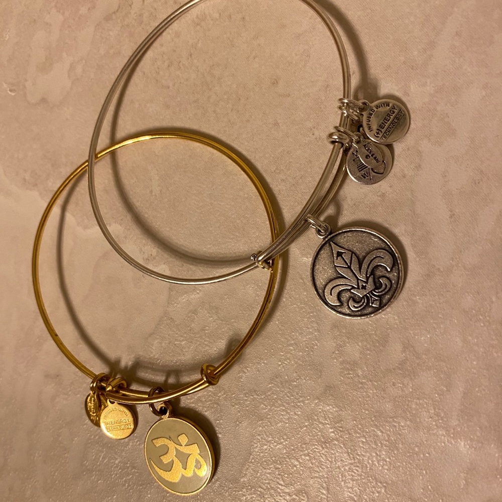 Set of Alex and Ani Bangles.
